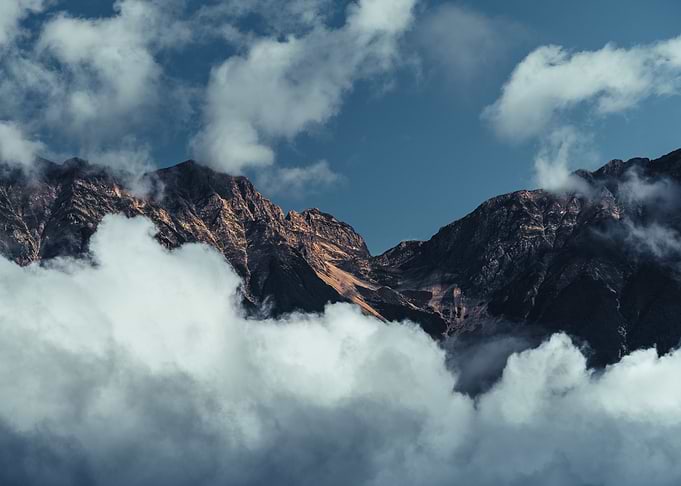 Majestic Mountain Peaks Above Clouds