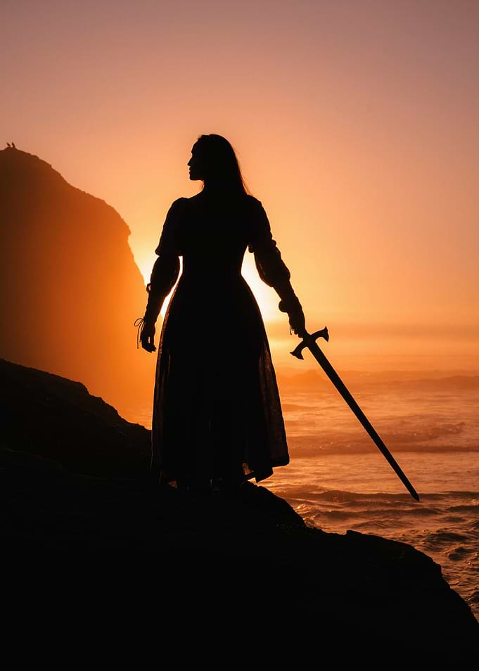 Warrior Woman Silhouette at Sunset