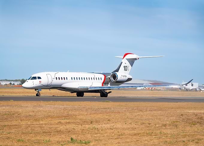 Private jet taxiing on runway - Dassault Falcon 10X