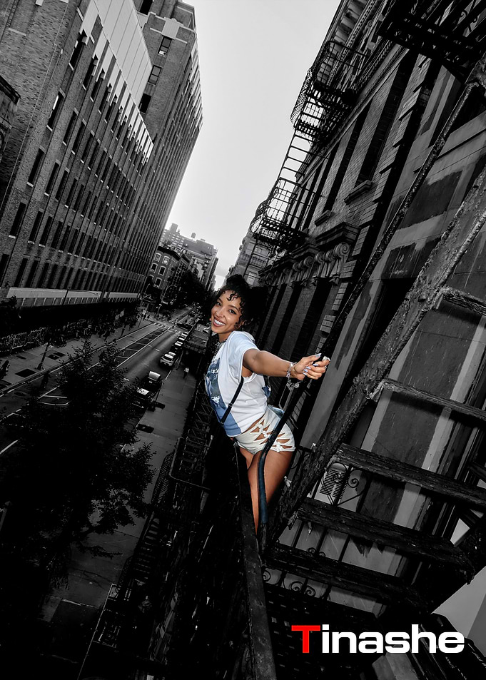 Tinashe on a City Fire Escape