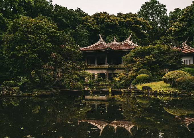 Traditional Japanese Pavilion by Pond
