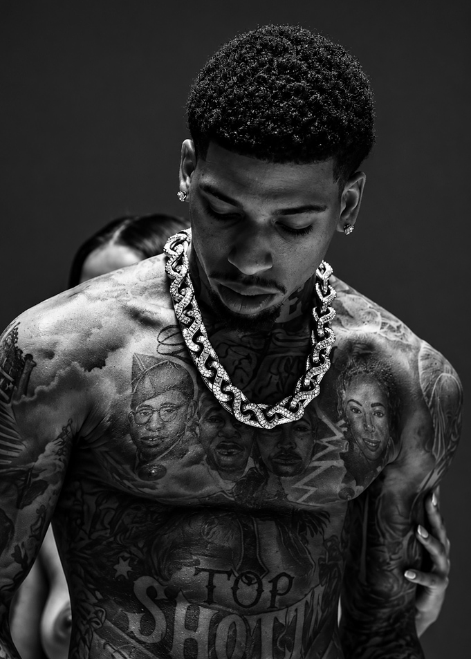 Tattooed Man Wearing Diamond Chain