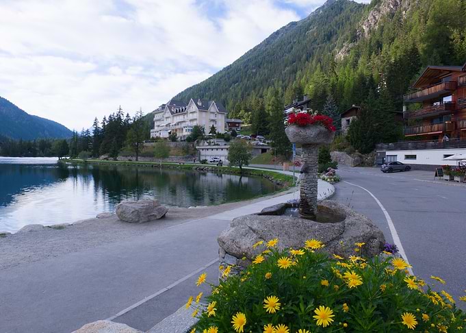 Scenic Alpine Lake and Stone Fountain - Champex Lac Switzerland