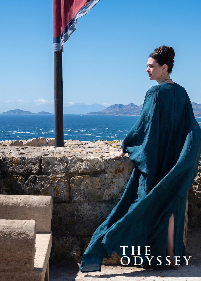 Woman in Teal Gown Overlooking Sea
