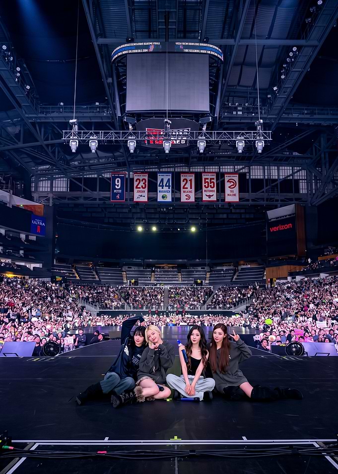 aespa Members on Stage at Arena