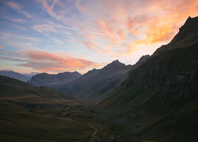 Sunset Over Mountain Valley