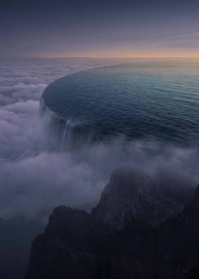 Surreal Ocean Waterfall Above Clouds