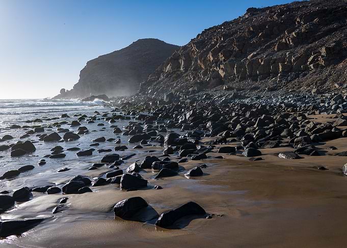 Rocky Beach Shoreline at Sunset
