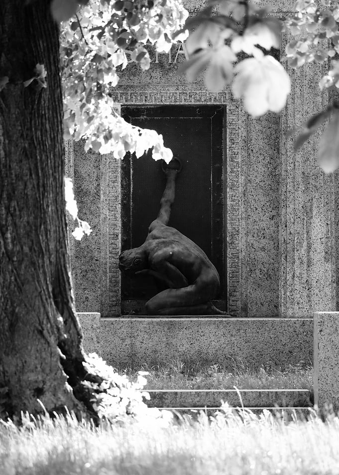 Somber Cemetery Statue Sculpture