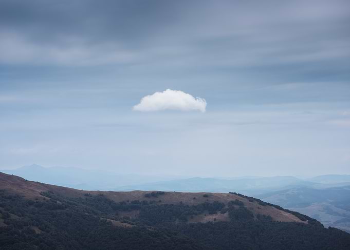 Single Cloud Over Mountain Range