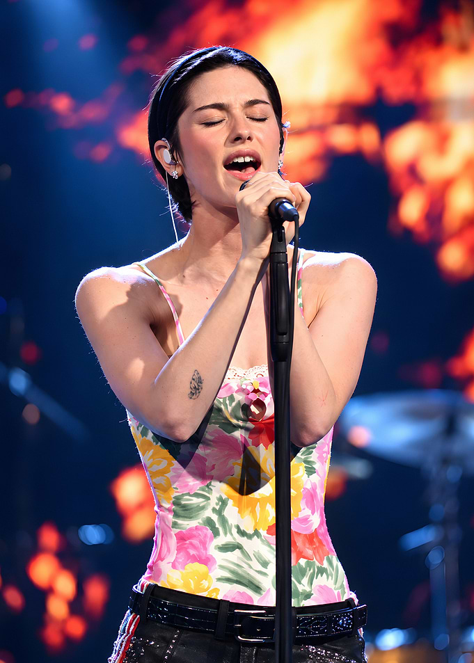 Gracie Abrams performing live on stage