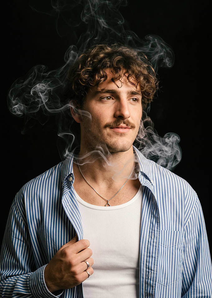 Portrait of a man with smoke