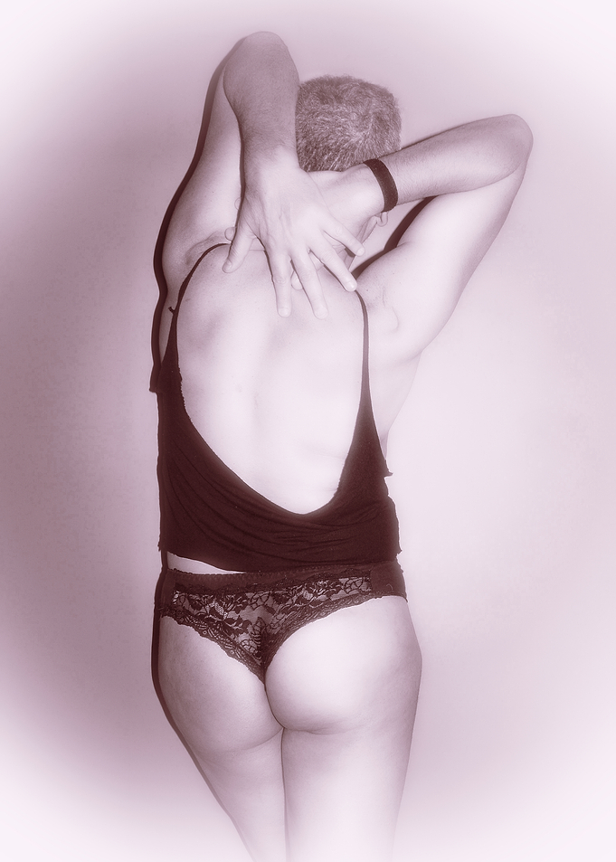 Person in black lingerie posing