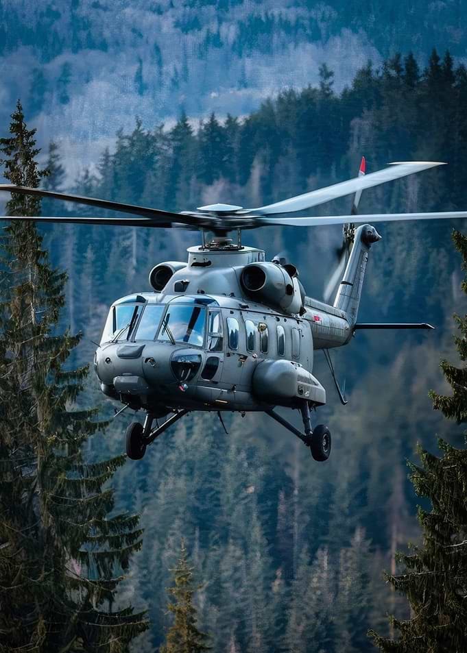 Military Helicopter Flying Over Forest
