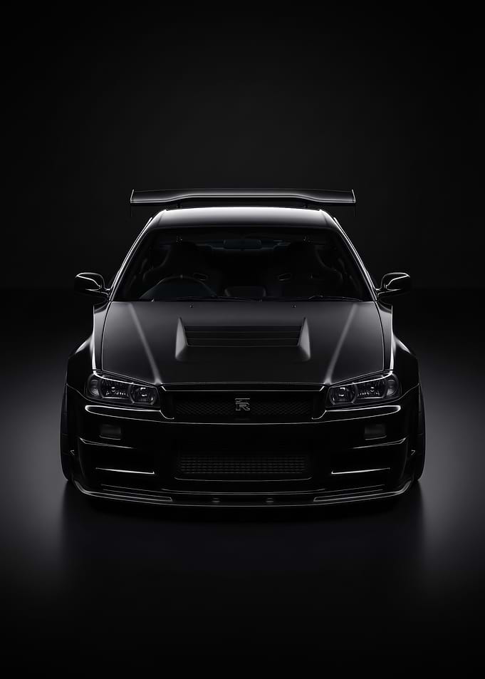 A sleek front profile black car minimalist poster