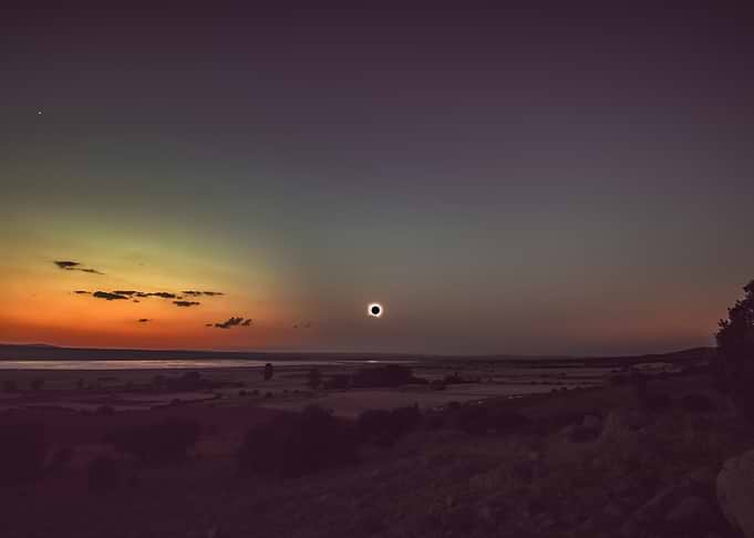 Total Solar Eclipse Over Landscape