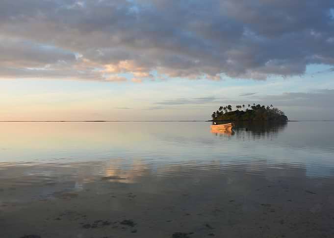 Small Boat Near Tropical Island