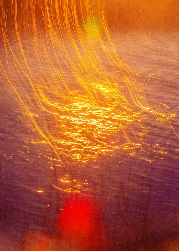 Abstract Golden Light Reflections on Water