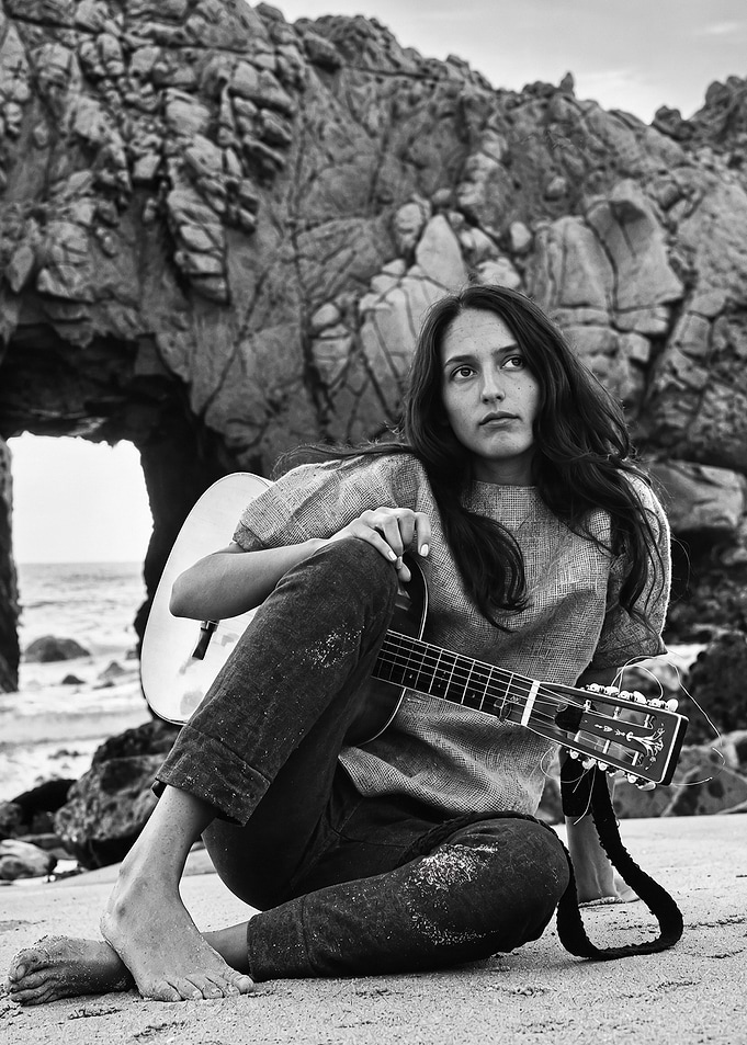 Joan Baez with Guitar on Beach