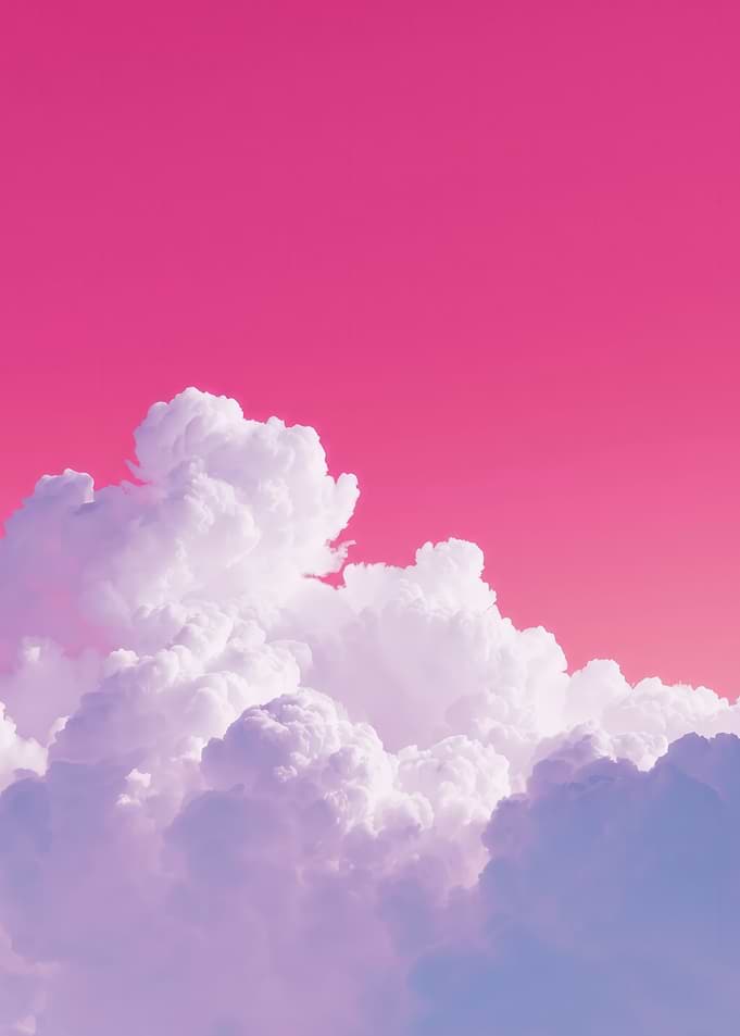 Vibrant Pink Sky with Fluffy Clouds