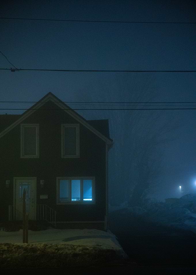 Eerie House in Foggy Night