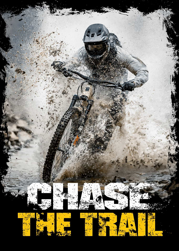 Mountain Biker Splashing Through Mud