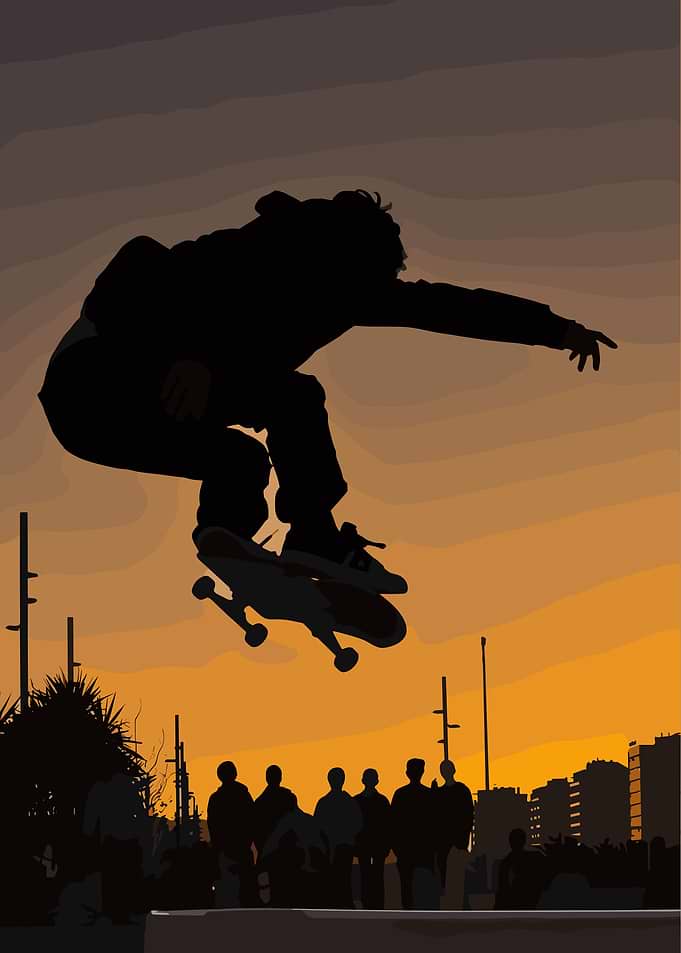 Skateboarder Performing Jump at Sunset