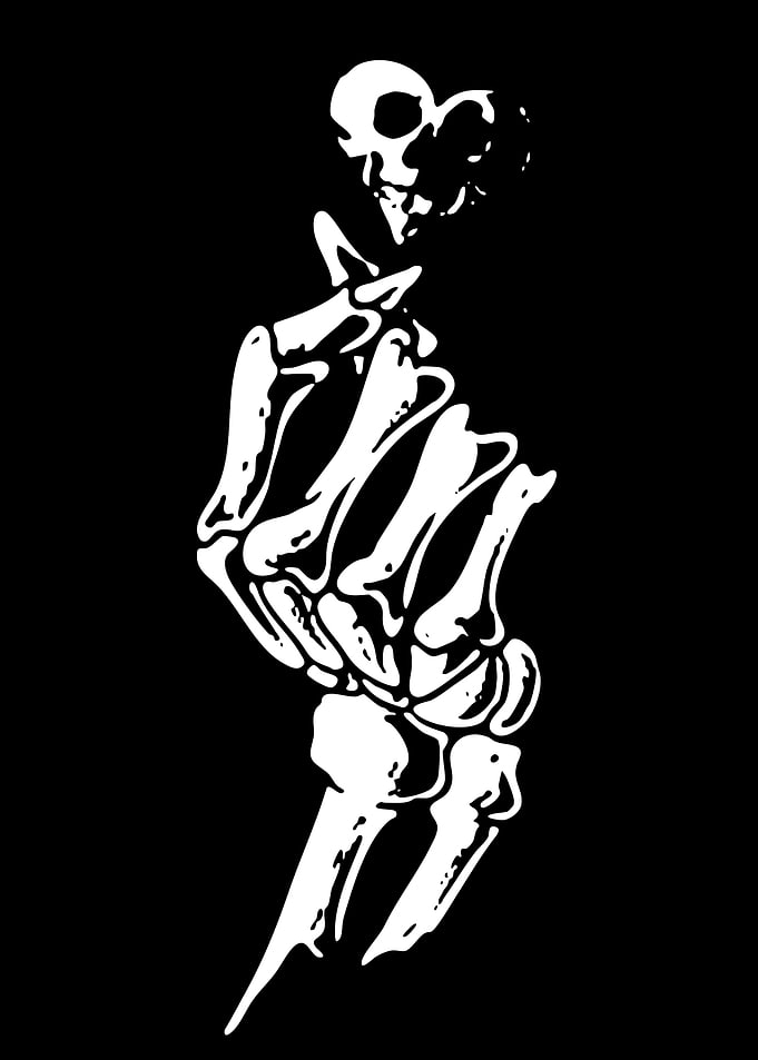 Skeleton Hand Making Heart Gesture