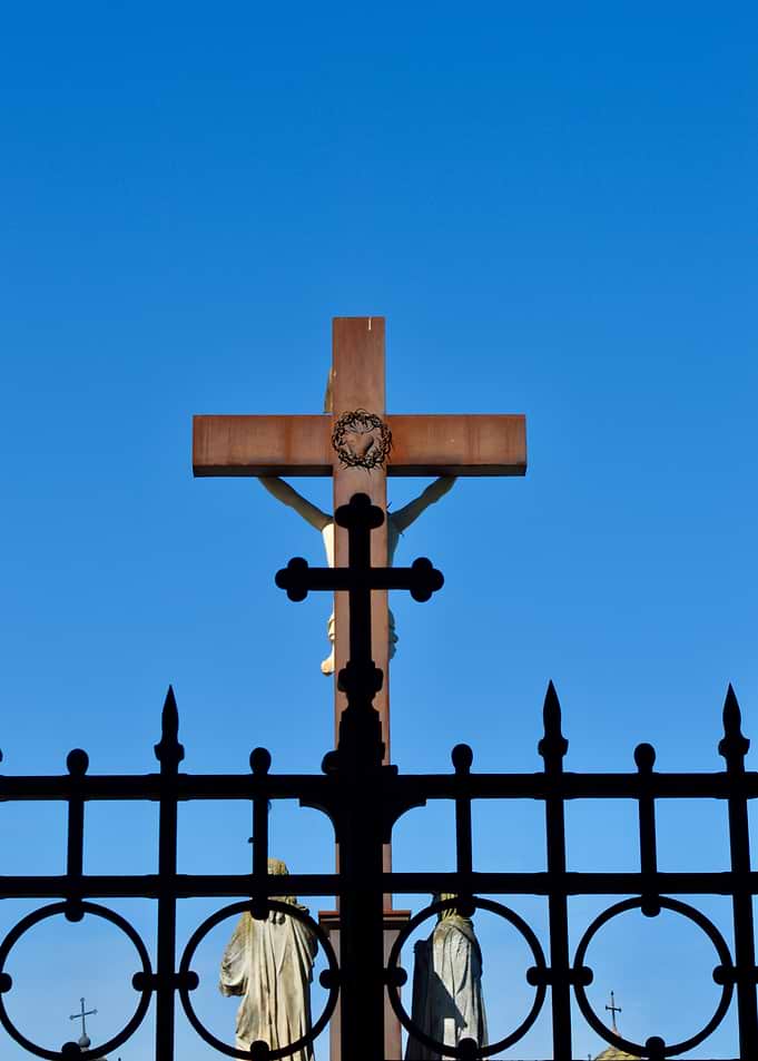 Crucifix Behind Iron Gate