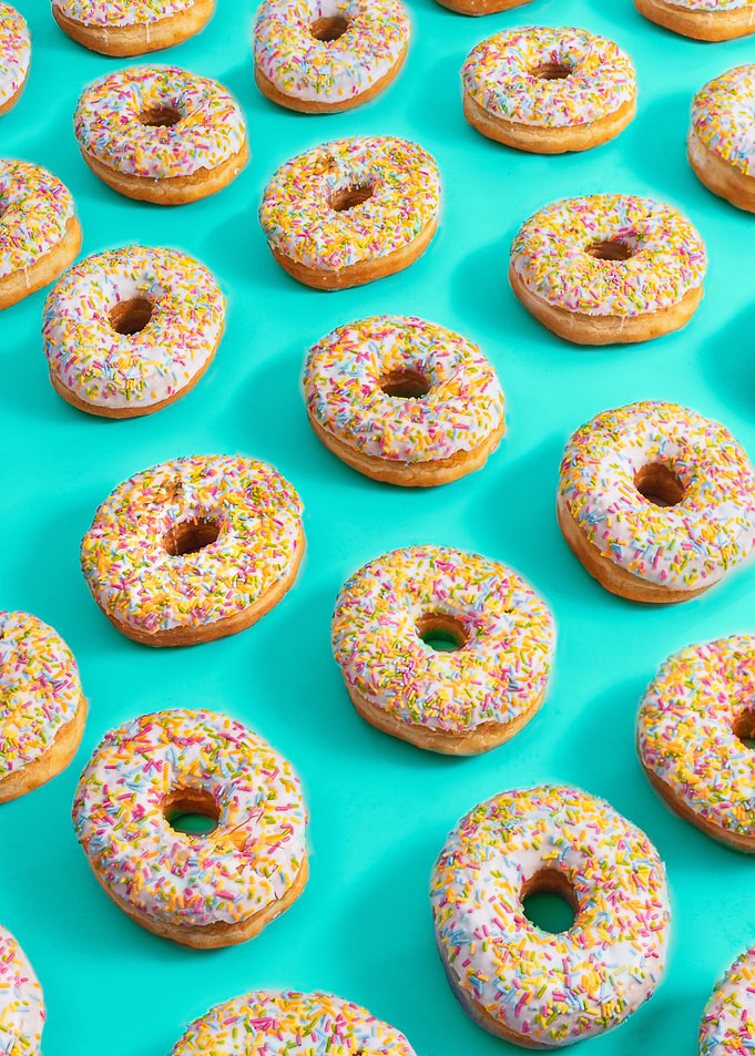 Pattern of Sprinkled Glazed Donuts