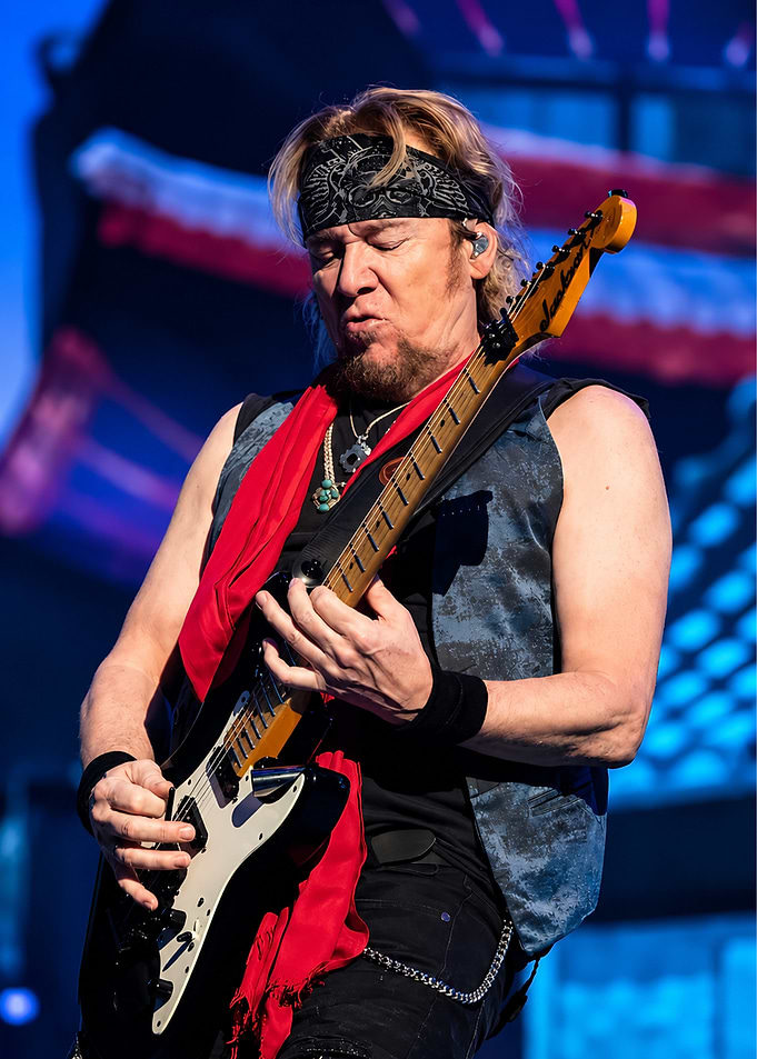 Rock Guitarist Performing Live on Stage