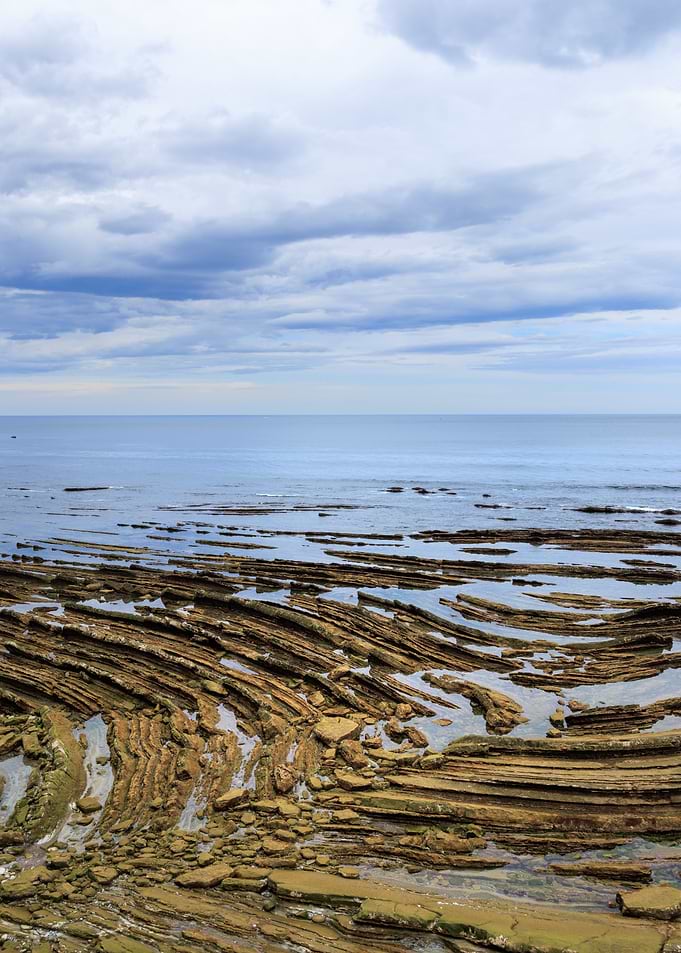 Layered Rock Formations at the Coast