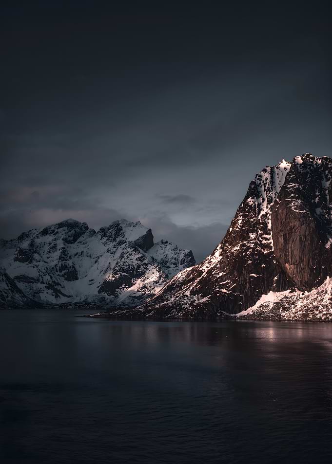 Snowy Mountains Over Dark Water