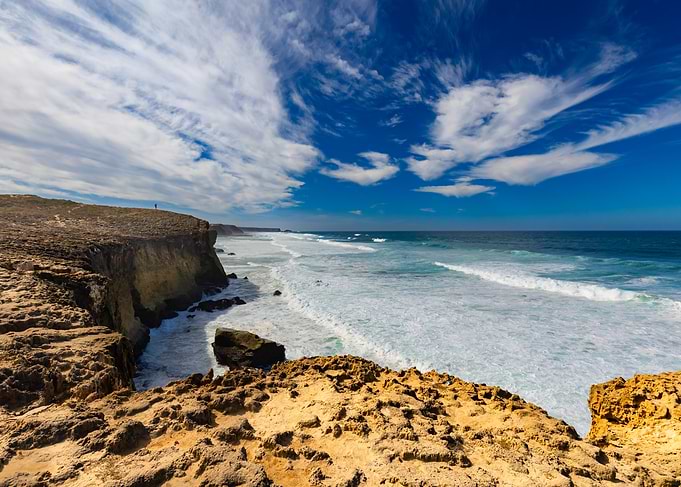 Rugged Coastal Cliffs and Ocean Waves