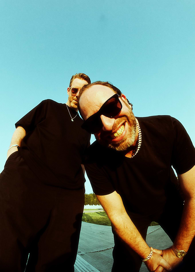 Two Men in Black T-shirts