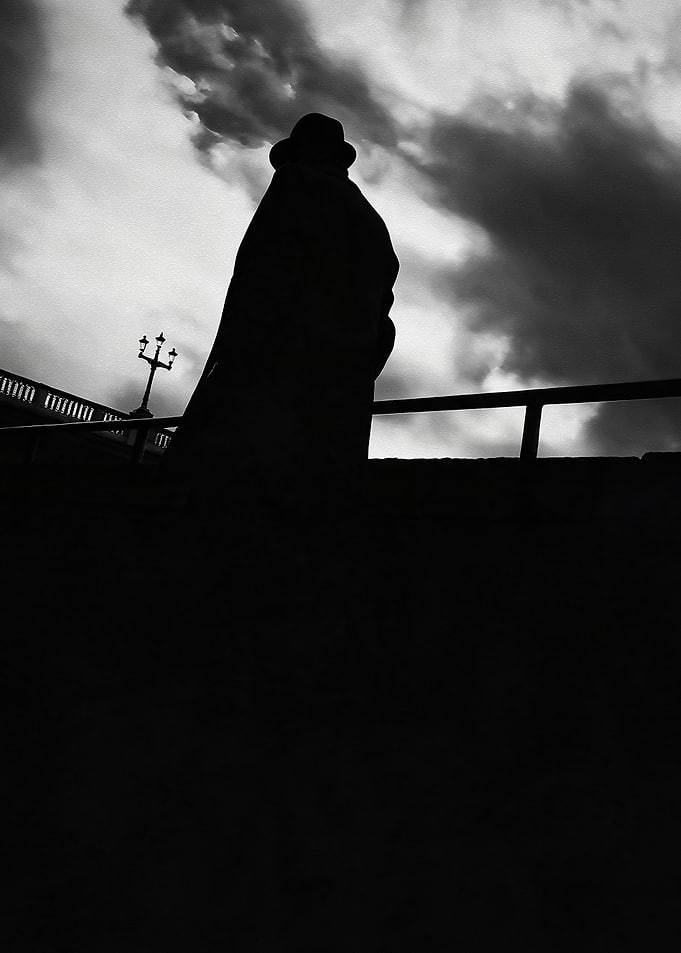 Silhouette of a Man in Hat