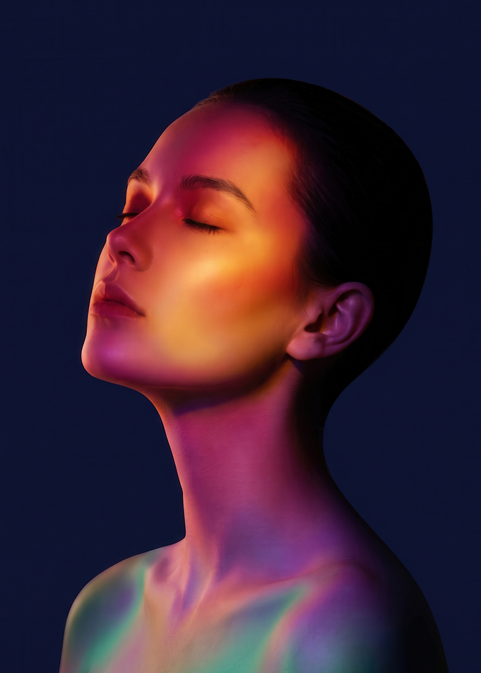 Woman with Vibrant Rainbow Lighting