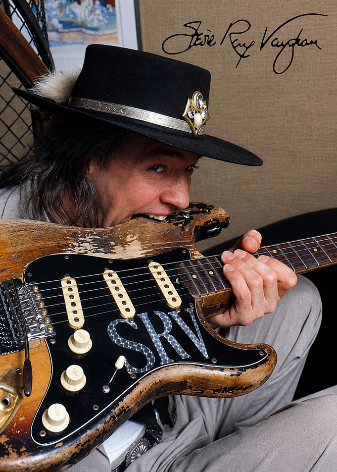 Stevie Ray Vaughan Biting His Guitar