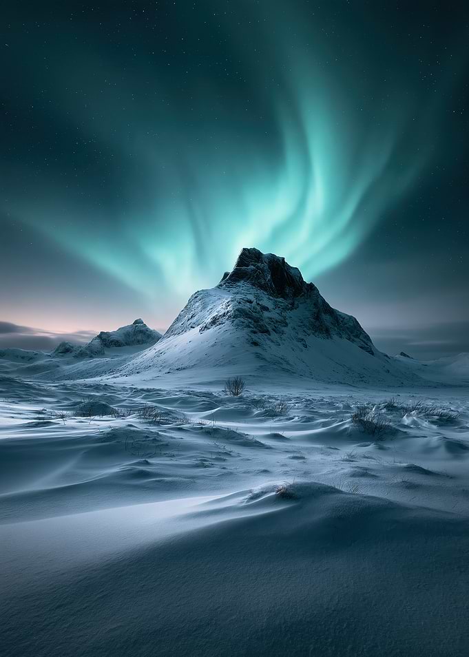 Aurora Borealis Over Snowy Mountain Peak