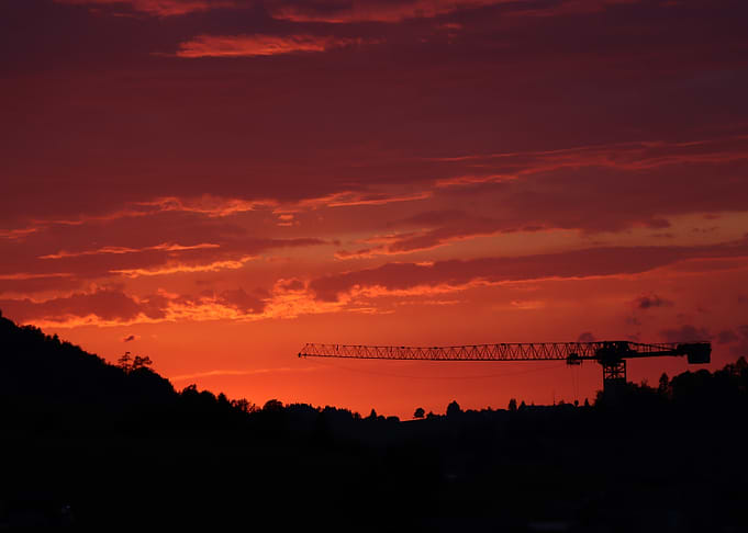 Construction Crane Silhouette at Sunset