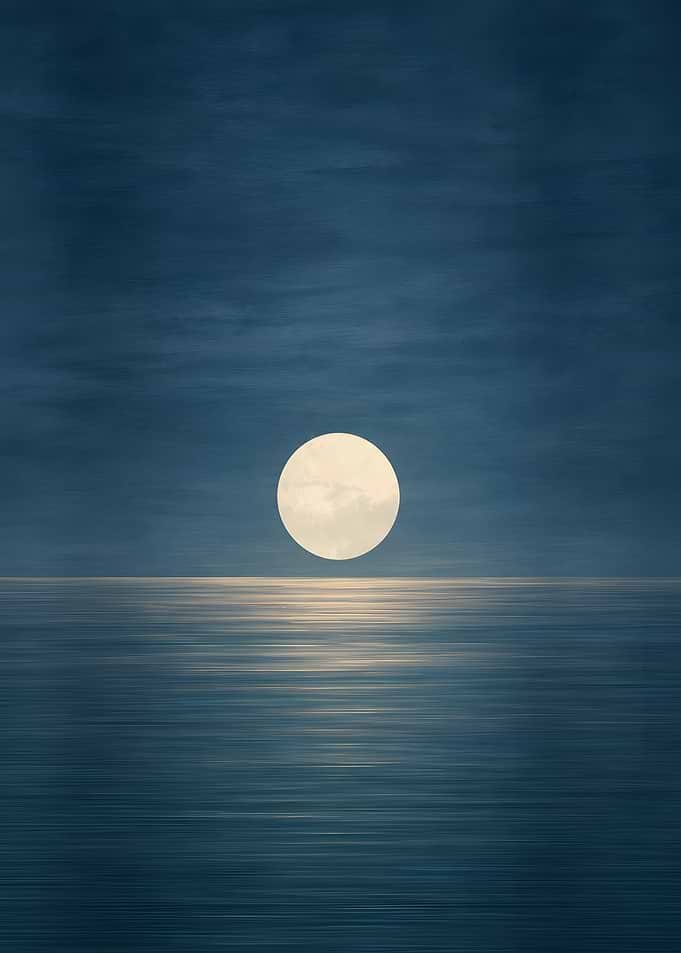 Full Moon Glowing Over Dark Ocean