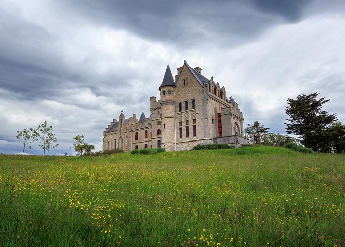 Historic Stone Castle in Meadow