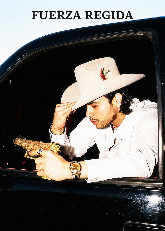 Fuerza Regida Singer in Cowboy Hat