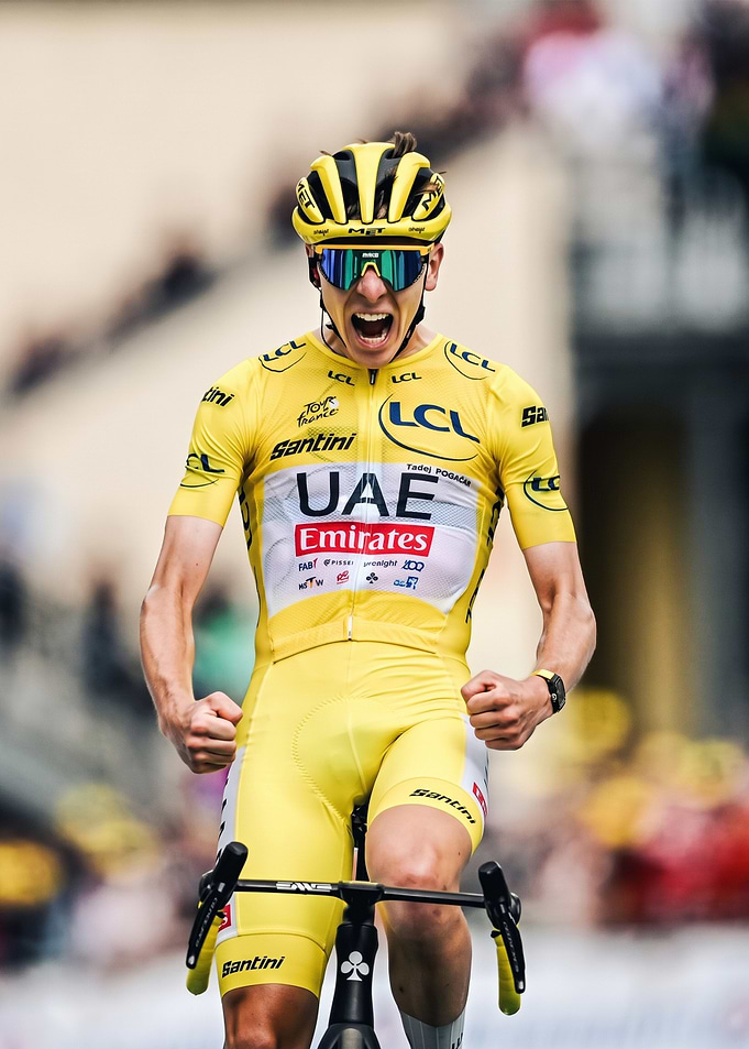 Tadej Pogačar celebrating Tour de France victory