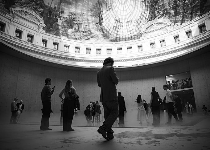 People in a grand rotunda