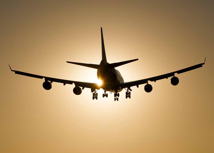 B747-400 Silhouette Against Golden Sunset