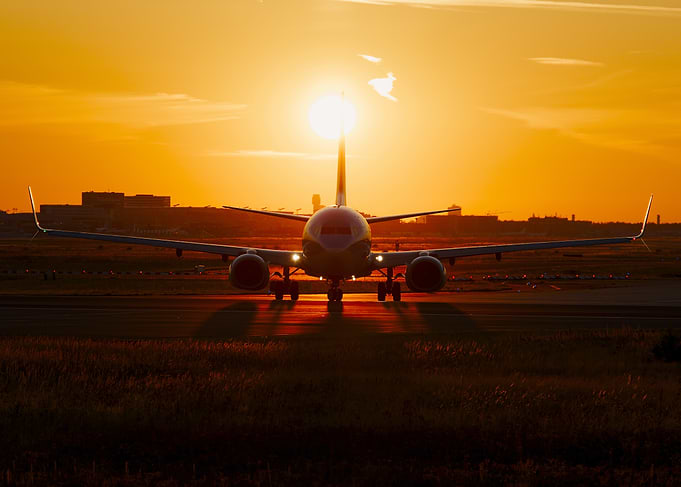 TUI B737 silhouette at sunrise