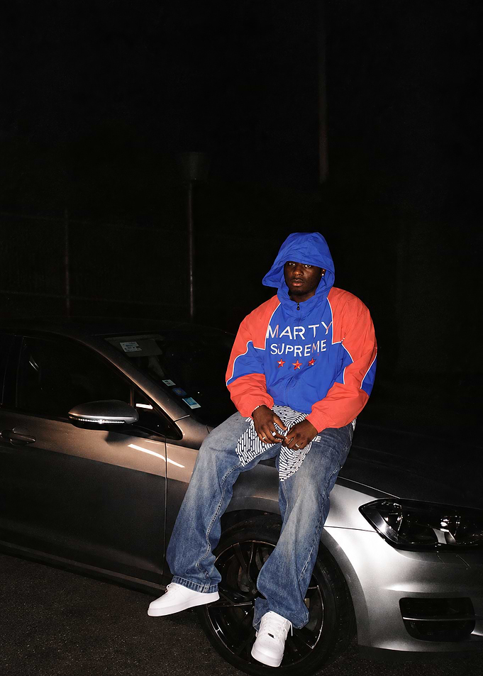 Man in Marty Supreme Hoodie