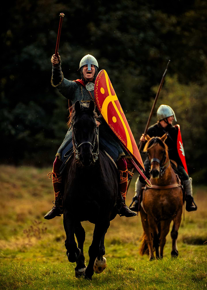 Medieval Knights Charging on Horseback