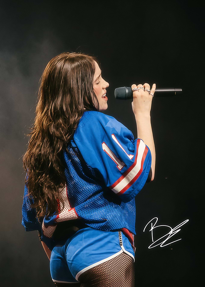 Billie Eilish performing on stage